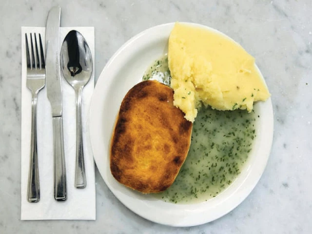 purists insist on using a knife and fork to eat pie and mash photo afp purists insist on using a knife and fork to eat pie and mash photo afp