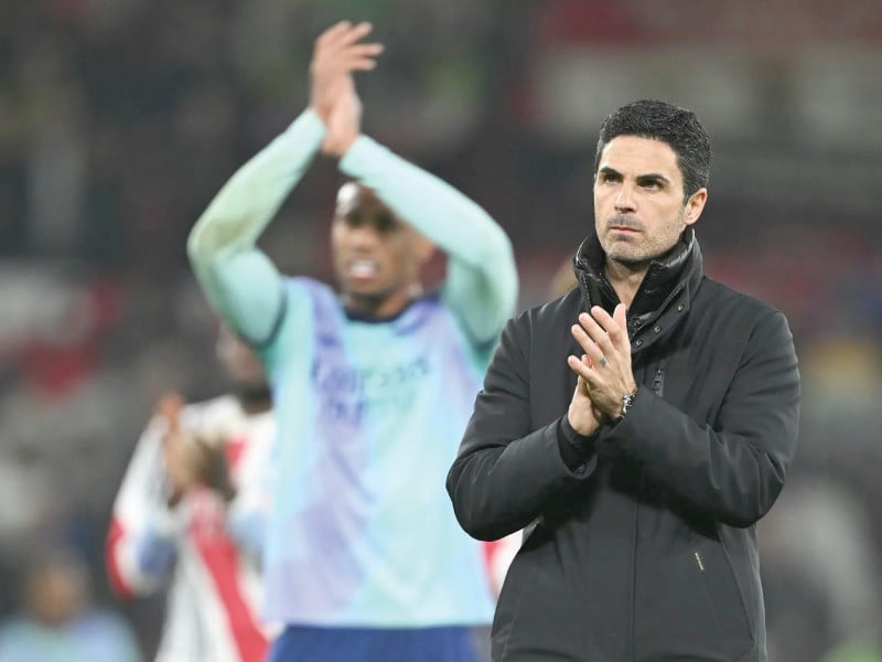 mikel arteta manager of arsenal acknowledges the fans after the draw during the premier league football match at manchester united photo afp