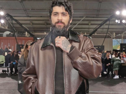 zayn previews fuchsia sea with striking lyric on race