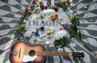 a guitar flowers and other tokens lie on the imagine mosaic on the 45th anniversary of john lennon s death in the strawberry fields section of central park in new york city in december photo reuters