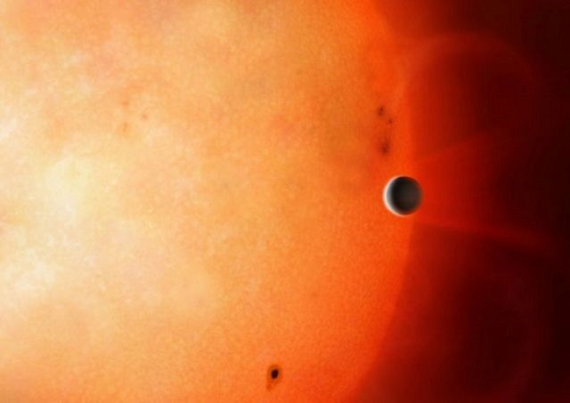 artist s impression showing a neptune sized planet orbiting a star located 730 light years from our solar system photo reuters