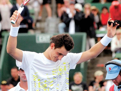 tennis tomic triumphs in kooyong