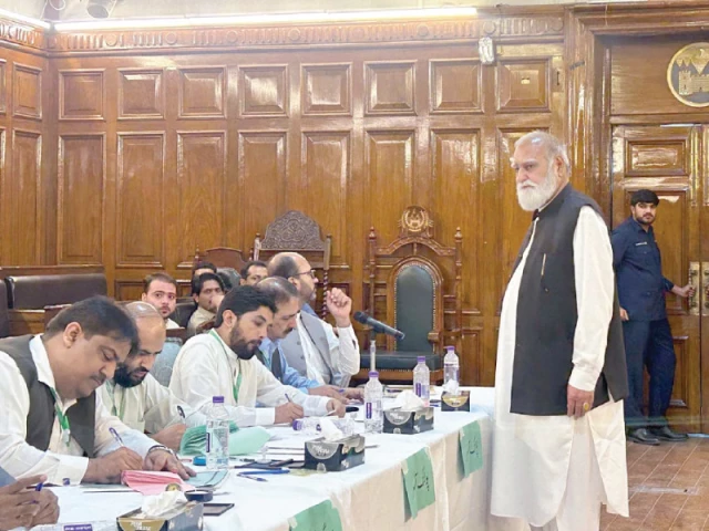 a lawmaker casts his vote during the senate elections at the k p assembly on monday polling was held for seven general seats two reserved for women and two for technocrats including ulema photo ppi