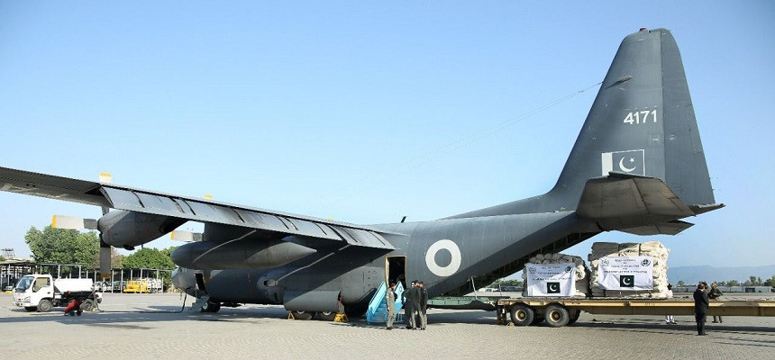A PAF C-130 aircraft being loaded with the relief goods for flood affected areas of Afghanistan: PHOTO: PMO