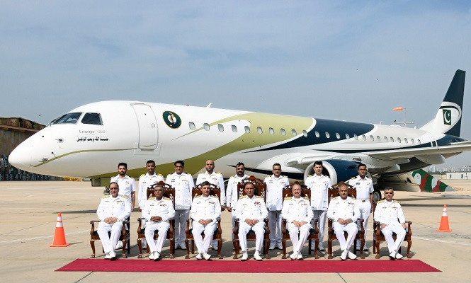 chief of the naval staff admiral muhammad amjad khan niazi in a group photo with commander pakistan fleet and officers of naval aviation at the induction ceremony of long range maritime patrol jet aircraf in pakistan navy photo navy prd