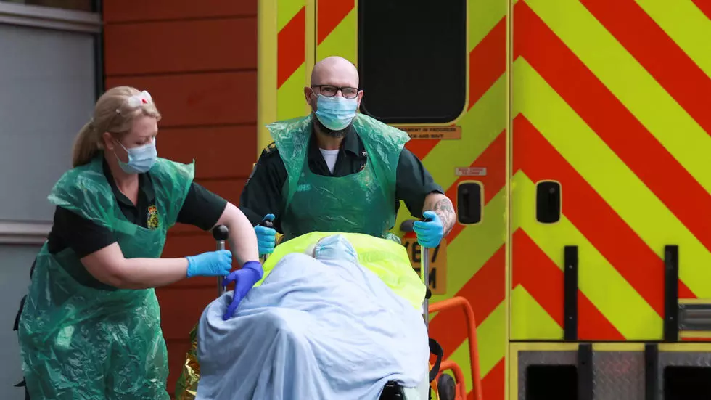 health care workers transport a patient at the royal london hospital as the spread of the coronavirus disease covid 19 continues in london britain january 26 photo afp file