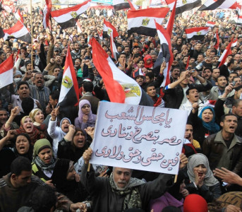 a year after uprising egyptians celebrate and protest