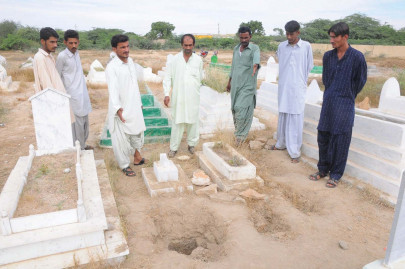 what lies beneath three graves mysteriously dug up in multan