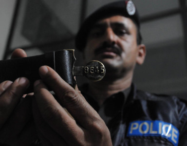 shot dead policeman gunned down