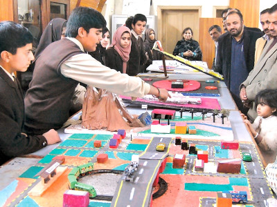 science fair students tell adults about issues that need attention