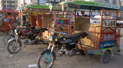 david goliath karachi s tiny qingqi muscles in on big bus routes with cheaper fares