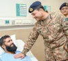 coas general syed asim munir enquires after the well being of a soldier at the combined military hospital in rawalpindi photo app