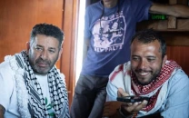 israel questions two gaza flotilla activists