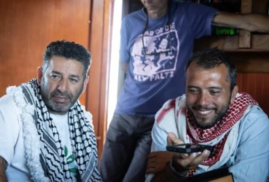 israel questions two gaza flotilla activists