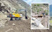 excavators carve through mountains of debris on the battered karakoram highway where relentless rains flash floods and landslides stranded thousands of travellers across lower kohistan over the past 72 hours photos express