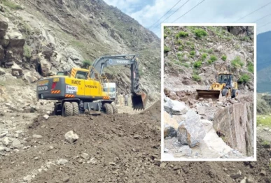 excavators carve through mountains of debris on the battered karakoram highway where relentless rains flash floods and landslides stranded thousands of travellers across lower kohistan over the past 72 hours photos express