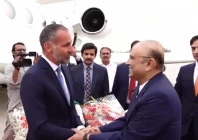 president asif ali zardari receives prince rahim aga khan v at islamabad s noor khan airbase on wednesday screengrab
