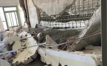 seven rescued after house wall collapses