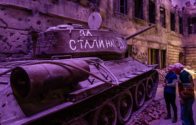 People look at a Russian tank on January 29, 2017 as part of the permanent exhibition of Museum of Second World War opend for two days ahead the offical opening planned for the end of February in Gdansk, Poland. Poles on Sunday got their first -- and possibly last -- glimpse of a new Museum of the Second World War, a project slammed by Poland's right-wing government as underplaying the country's harrowing wartime fate. PHOTO: AFP