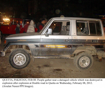 four injured in double road grenade attack four injured in double road grenade attack