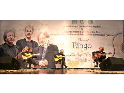 musical performance guitar trio enthrals audience with traditional spanish beats