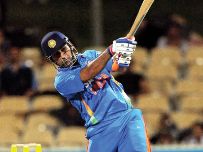 tri nation series dhoni stars in thrilling tie