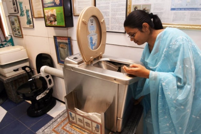 indian woman rewarded for tough toilet stand