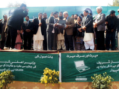 laptop distribution ceremony country s defence weakened by reliance on foreign aid