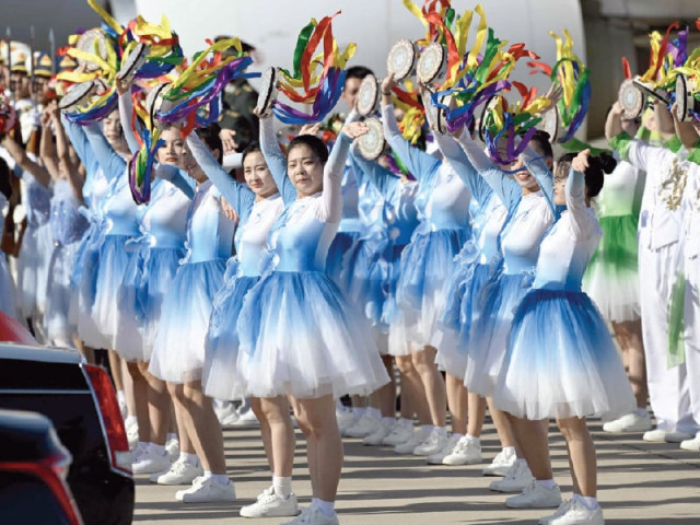 dancers perform during the arrival of zimbabwe s president emmerson mnangagwa at beijing capital international airport photo afp dancers perform during the arrival of zimbabwe s president emmerson mnangagwa at beijing capital international airport photo afp