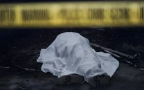 man shot dead in suspected robbery