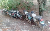 official police motorbikes left to rust away
