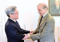 china s ambassador to pakistan jiang zaidong shakes hands with prime minister shehbaz sharif during a meeting in islamabad photo app