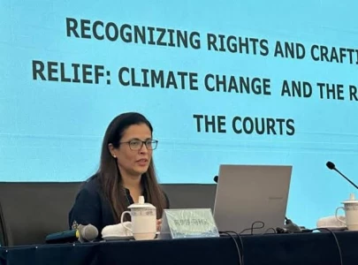 justice ayesha addresses climate forum in china