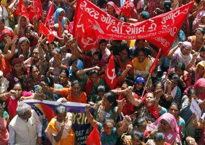 countrywide strike over tighter labour laws poses fresh challenge to indian govt