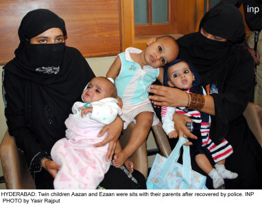 smiles all around court reunites mother with kidnapped infants