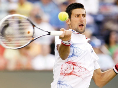 tennis djokovic wozniacki advance at indian wells
