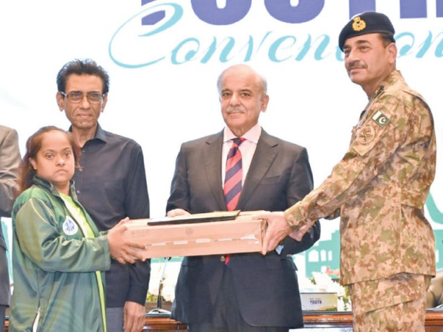 pm shehbaz sharif and coas gen asim munir distribute laptops among high achievers during the national youth convention in islamabad photo express pm shehbaz sharif and coas gen asim munir distribute laptops among high achievers during the national youth convention in islamabad photo express