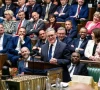 uk minister quits calls for leadership contest