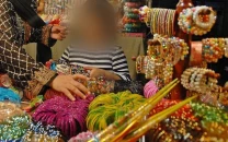 women add colour to eid preparations