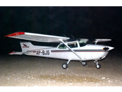 red alert cessna aircraft lands near highway