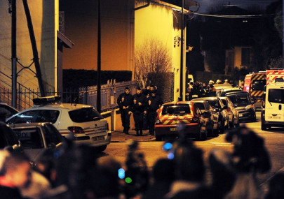 deadly attacks french police besiege al qaeda gunman