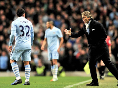 premier league mancini lauds tevez as city hit back