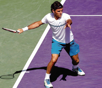 federer advances at miami open