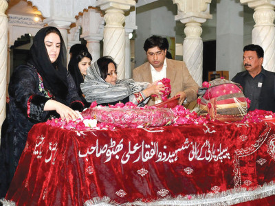 bhutto graves may be silent but for the people who care for them memories are clear