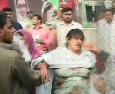 in protest woman resorts to self harm outside governor house in protest woman resorts to self harm outside governor house