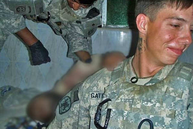 photos emerge of us soldiers posing with maimed bodies of dead afghan insurgents photos emerge of us soldiers posing with maimed bodies of dead afghan insurgents