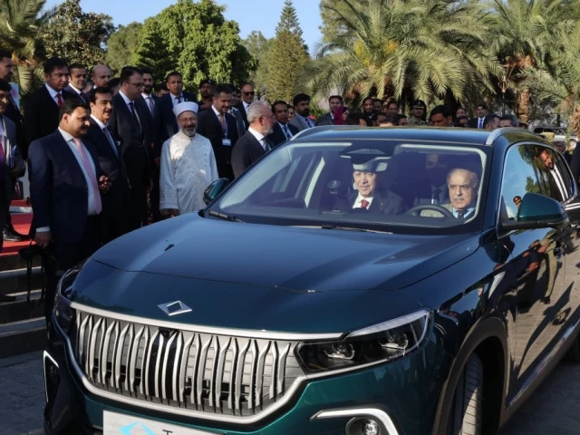 turkish president recep tayyip erdogan and prime minister shehbaz sharif drive a togg t10x turkiye s domestic electric car in islamabad on thursday february 13 2025 courtesy daily sabah