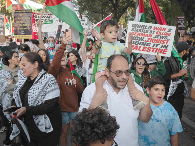 demonstrators march in protest to the war in gaza near the united center where the democratic national convention is taking place in chicago photo afp demonstrators march in protest to the war in gaza near the united center where the democratic national convention is taking place in chicago photo afp