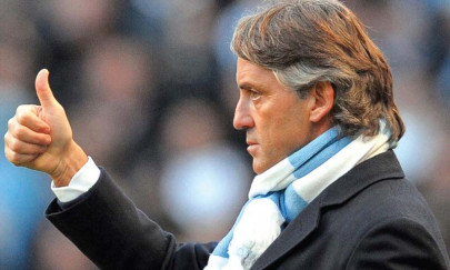 english premier league the job s not done yet says mancini