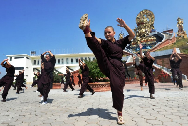 nepal s kung fu nuns practise karma with a kick nepal s kung fu nuns practise karma with a kick